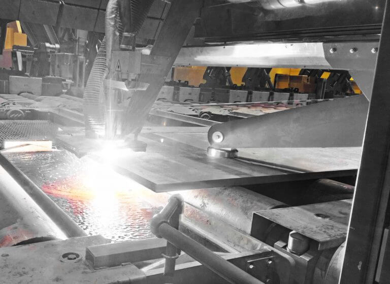 mechanized plasma cut of an extremely hot steel slab