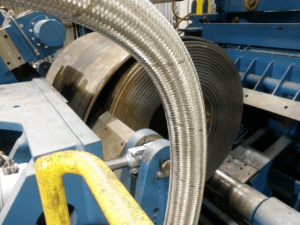 Sampling a steel coil by automated plasma cut operation